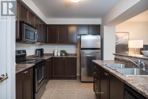 769 Challinor Terrace, Milton, ON - Indoor Photo Showing Kitchen With Double Sink