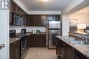 769 Challinor Terrace, Milton, ON  - Indoor Photo Showing Kitchen With Double Sink 