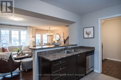 769 Challinor Terrace, Milton, ON - Indoor Photo Showing Kitchen With Double Sink