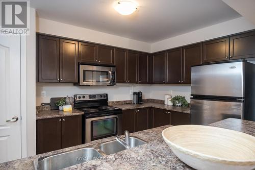 769 Challinor Terrace, Milton, ON - Indoor Photo Showing Kitchen With Double Sink