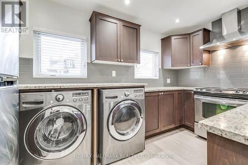 #2 - 14 Rosemount Avenue, Toronto, ON - Indoor Photo Showing Laundry Room