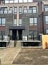 18 - 155 Tapscott Road, Toronto, ON  - Outdoor With Facade 