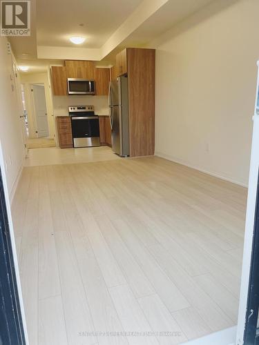 18 - 155 Tapscott Road, Toronto, ON - Indoor Photo Showing Kitchen With Stainless Steel Kitchen