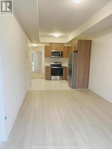 18 - 155 Tapscott Road, Toronto, ON - Indoor Photo Showing Kitchen With Stainless Steel Kitchen