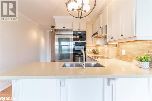 80 Orchard Point Road Unit# 604, Orillia, ON - Indoor Photo Showing Kitchen With Double Sink