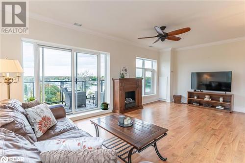 80 Orchard Point Road Unit# 604, Orillia, ON - Indoor Photo Showing Living Room With Fireplace