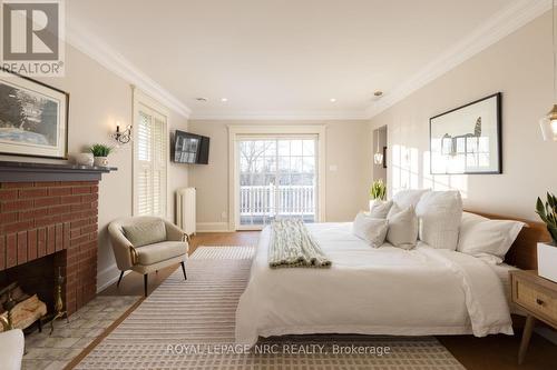 50 Hillcrest Avenue, St. Catharines (457 - Old Glenridge), ON - Indoor Photo Showing Bedroom With Fireplace