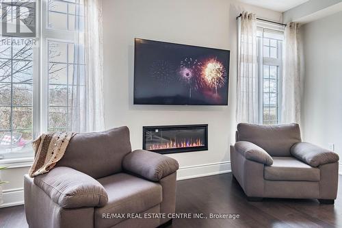 35 Arthur Griffin Crescent, Caledon, ON - Indoor Photo Showing Living Room With Fireplace