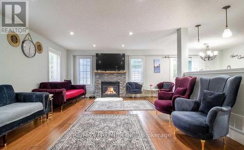 15 Dunsmore Lane, Barrie, ON - Indoor Photo Showing Living Room With Fireplace