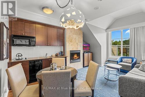 477 - 220 Gord Canning Drive, Blue Mountains (Blue Mountain Resort Area), ON - Indoor With Fireplace