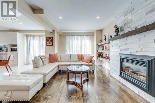 10 Anne Court, Grimsby, ON - Indoor Photo Showing Living Room With Fireplace