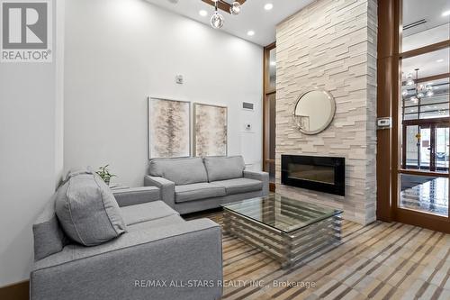 1603 - 9500 Markham Road, Markham, ON - Indoor Photo Showing Living Room With Fireplace