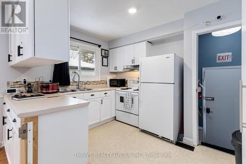 1215 Michael Street, London, ON - Indoor Photo Showing Kitchen With Double Sink