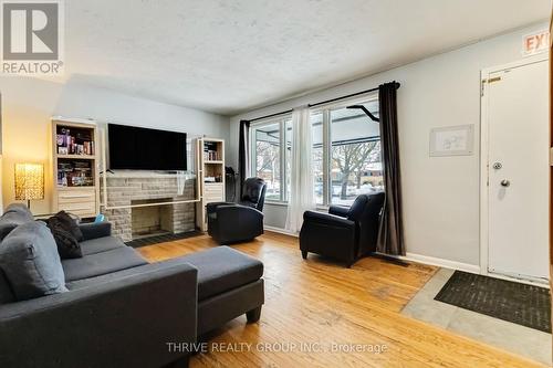 1215 Michael Street, London, ON - Indoor Photo Showing Living Room With Fireplace