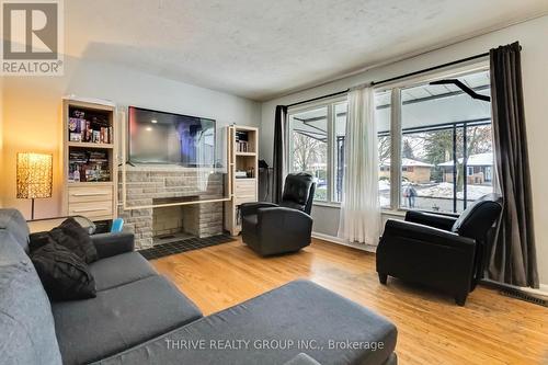 1215 Michael Street, London, ON - Indoor Photo Showing Living Room With Fireplace