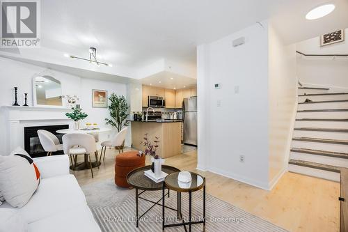 1203 - 22 Laidlaw Street, Toronto, ON - Indoor Photo Showing Living Room With Fireplace