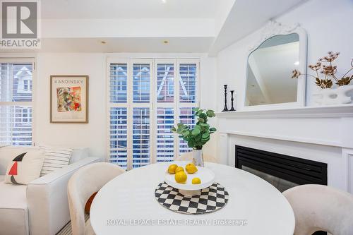 1203 - 22 Laidlaw Street, Toronto, ON - Indoor Photo Showing Dining Room With Fireplace