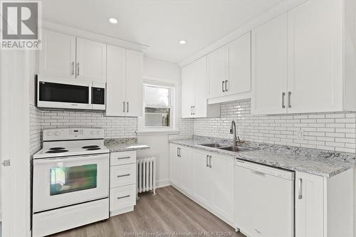 3310 Byng, Windsor, ON - Indoor Photo Showing Kitchen With Double Sink