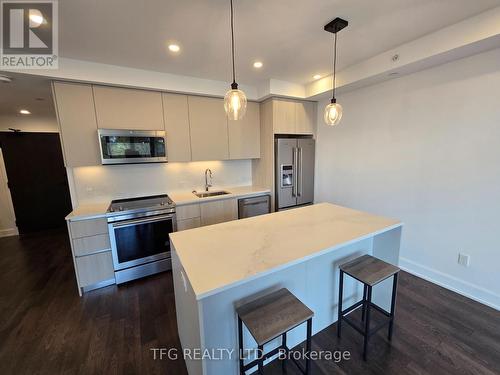 406 - 195 Hunter Street E, Peterborough (Ashburnham), ON - Indoor Photo Showing Kitchen With Stainless Steel Kitchen With Upgraded Kitchen