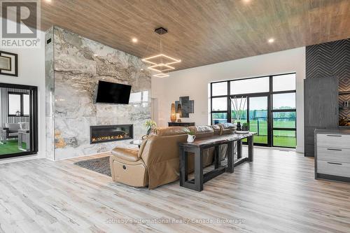 6903 36/37 Nottawasaga Side Road E, Clearview (Nottawa), ON - Indoor Photo Showing Living Room With Fireplace