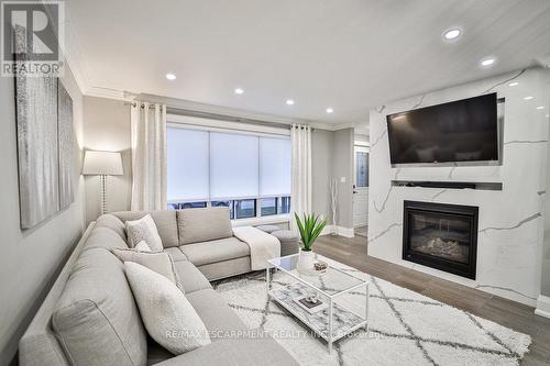 31 Nuffield Drive, Toronto, ON - Indoor Photo Showing Living Room With Fireplace