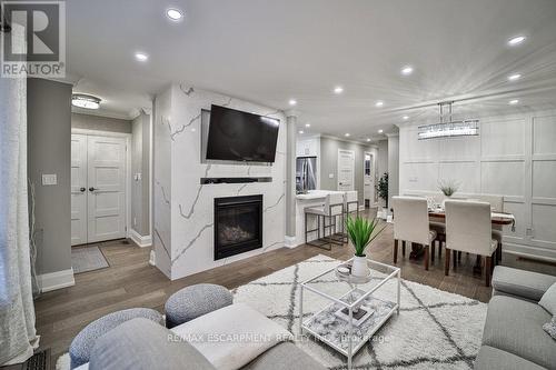 31 Nuffield Drive, Toronto, ON - Indoor Photo Showing Living Room With Fireplace