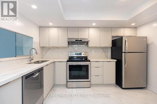 1613 - 330 Alton Towers Circle, Toronto, ON - Indoor Photo Showing Kitchen With Double Sink