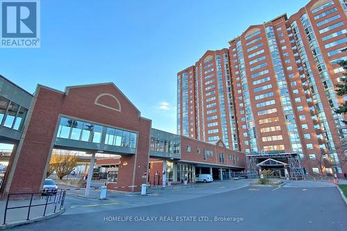 606 - 2460 Eglinton Avenue E, Toronto, ON - Outdoor With Facade