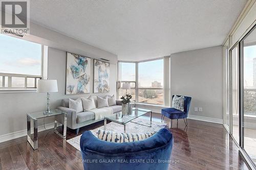 606 - 2460 Eglinton Avenue E, Toronto, ON - Indoor Photo Showing Living Room