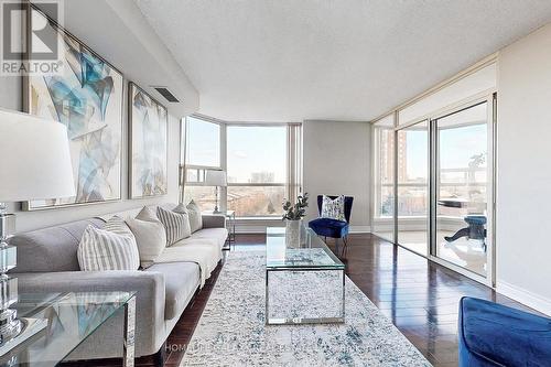 606 - 2460 Eglinton Avenue E, Toronto, ON - Indoor Photo Showing Living Room