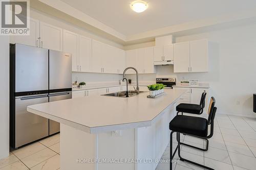 15 Sanford Circle, Springwater, ON - Indoor Photo Showing Kitchen