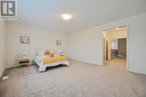 15 Sanford Circle, Springwater, ON - Indoor Photo Showing Bedroom