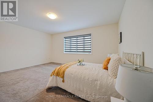 15 Sanford Circle, Springwater, ON - Indoor Photo Showing Bedroom