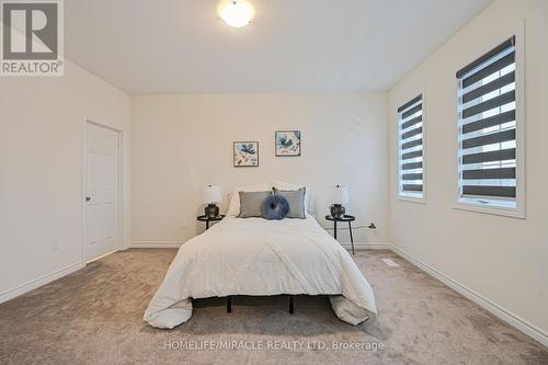 15 Sanford Circle, Springwater, ON - Indoor Photo Showing Bedroom