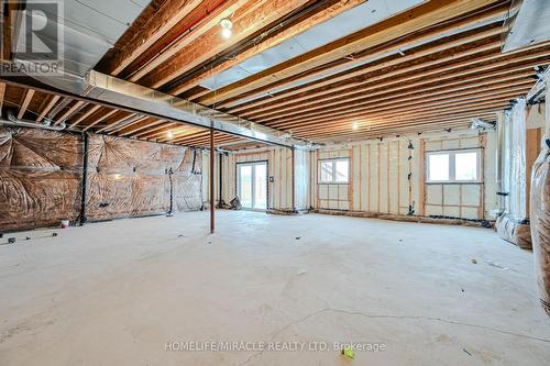 15 Sanford Circle, Springwater, ON - Indoor Photo Showing Basement