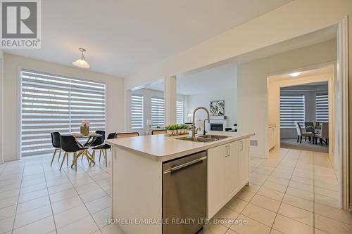 15 Sanford Circle, Springwater, ON - Indoor Photo Showing Kitchen With Double Sink