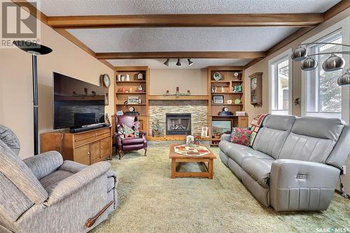 3375 Westminster Road, Regina, SK - Indoor Photo Showing Living Room With Fireplace