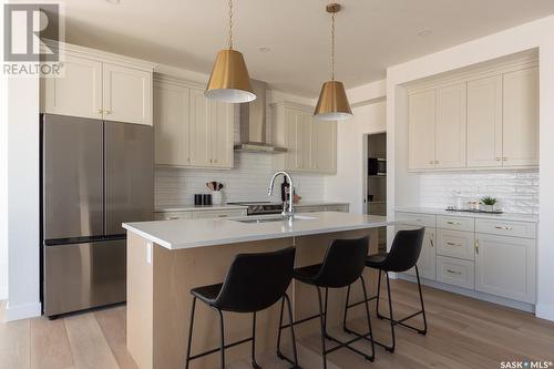 222 Flynn Bend, Saskatoon, SK - Indoor Photo Showing Kitchen With Upgraded Kitchen