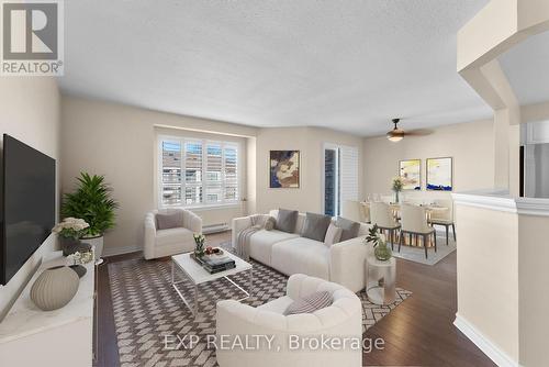 306B - 1061 Vansickle Road N, St. Catharines (453 - Grapeview), ON - Indoor Photo Showing Living Room