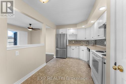 306B - 1061 Vansickle Road N, St. Catharines (453 - Grapeview), ON - Indoor Photo Showing Kitchen