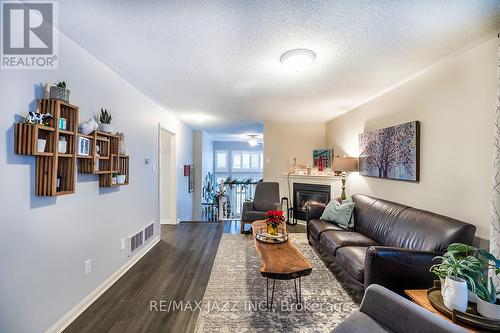 23 Schooner Lane, Clarington (Newcastle), ON - Indoor Photo Showing Living Room With Fireplace