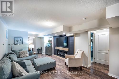 23 Schooner Lane, Clarington (Newcastle), ON - Indoor Photo Showing Living Room With Fireplace