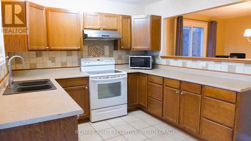 711 Muirfield Crescent, Kingston (East Gardiners Rd), ON - Indoor Photo Showing Kitchen With Double Sink