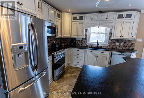 10 Robertson Drive, Whitewater Region, ON - Indoor Photo Showing Kitchen With Double Sink