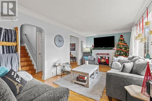 62 Maitland Street, Thorold (557 - Thorold Downtown), ON - Indoor Photo Showing Living Room With Fireplace