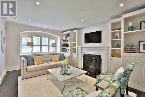 221 Chaplin Crescent, Toronto, ON - Indoor Photo Showing Living Room With Fireplace