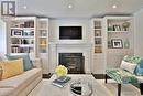 221 Chaplin Crescent, Toronto, ON  - Indoor Photo Showing Living Room With Fireplace 