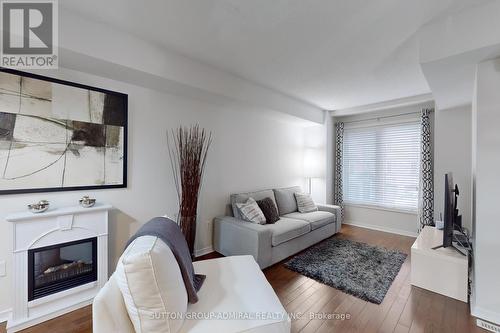 10 Burnsborough Street, Ajax, ON - Indoor Photo Showing Living Room With Fireplace