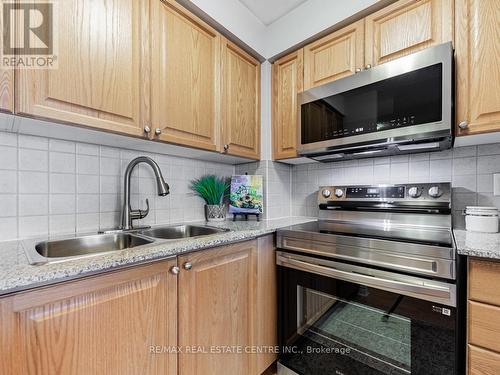 3010 - 310 Burnhamthorpe Road W, Mississauga, ON - Indoor Photo Showing Kitchen With Double Sink