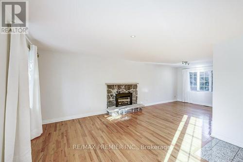 16 Woodvalley Drive, Toronto, ON - Indoor Photo Showing Other Room With Fireplace